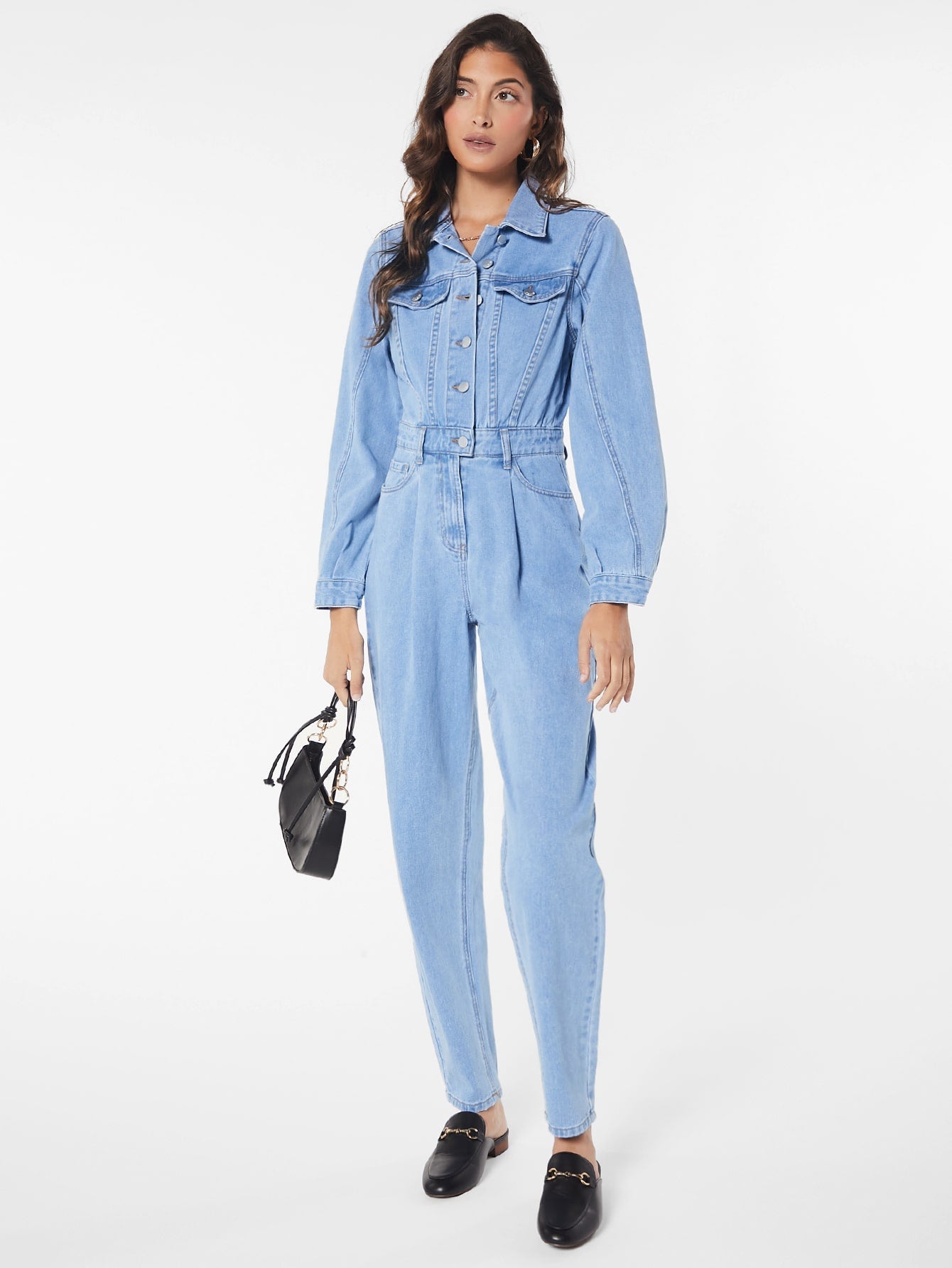 Blues jumpsuit with flap pocket made of denim with button closure at the front