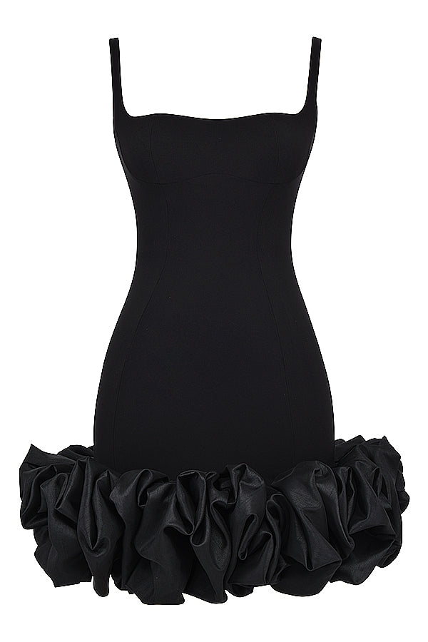 Black dress with ruffles at the hem