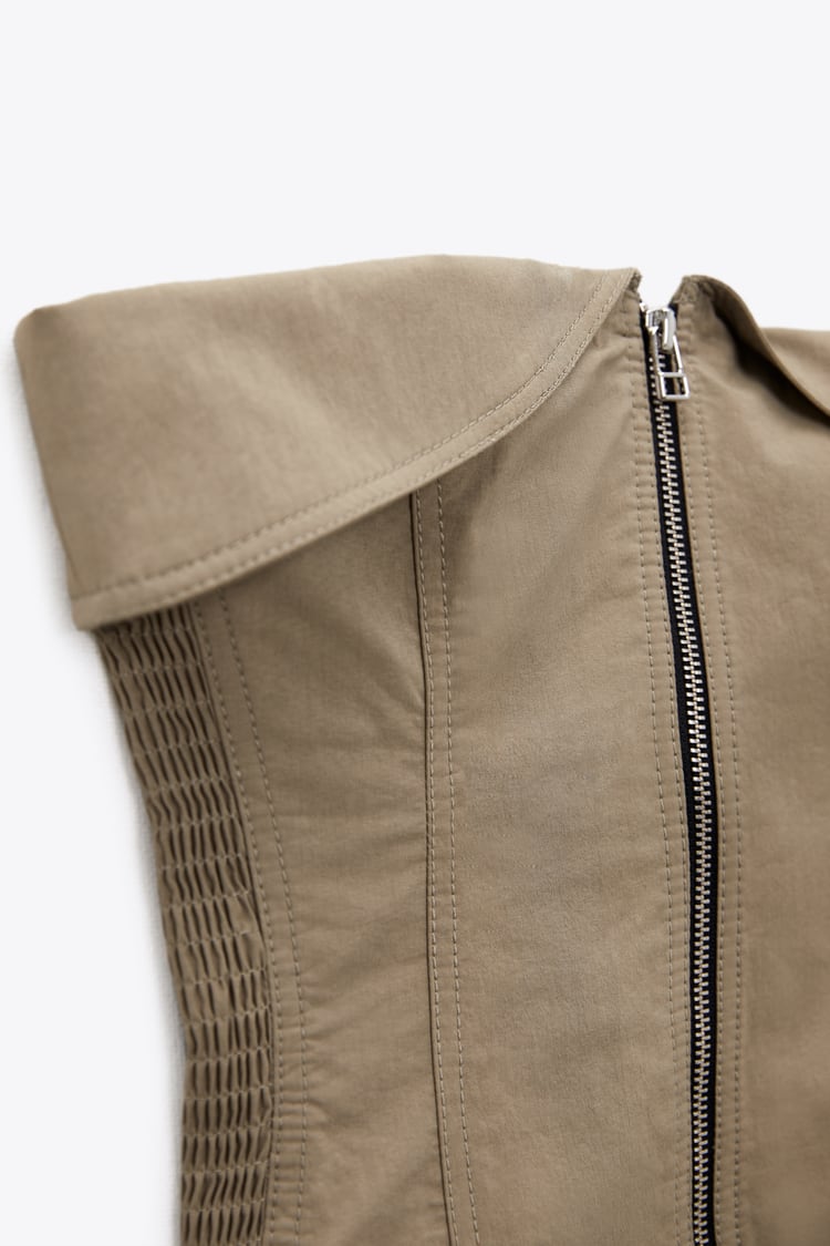 Zippered bustier and trousers in a set