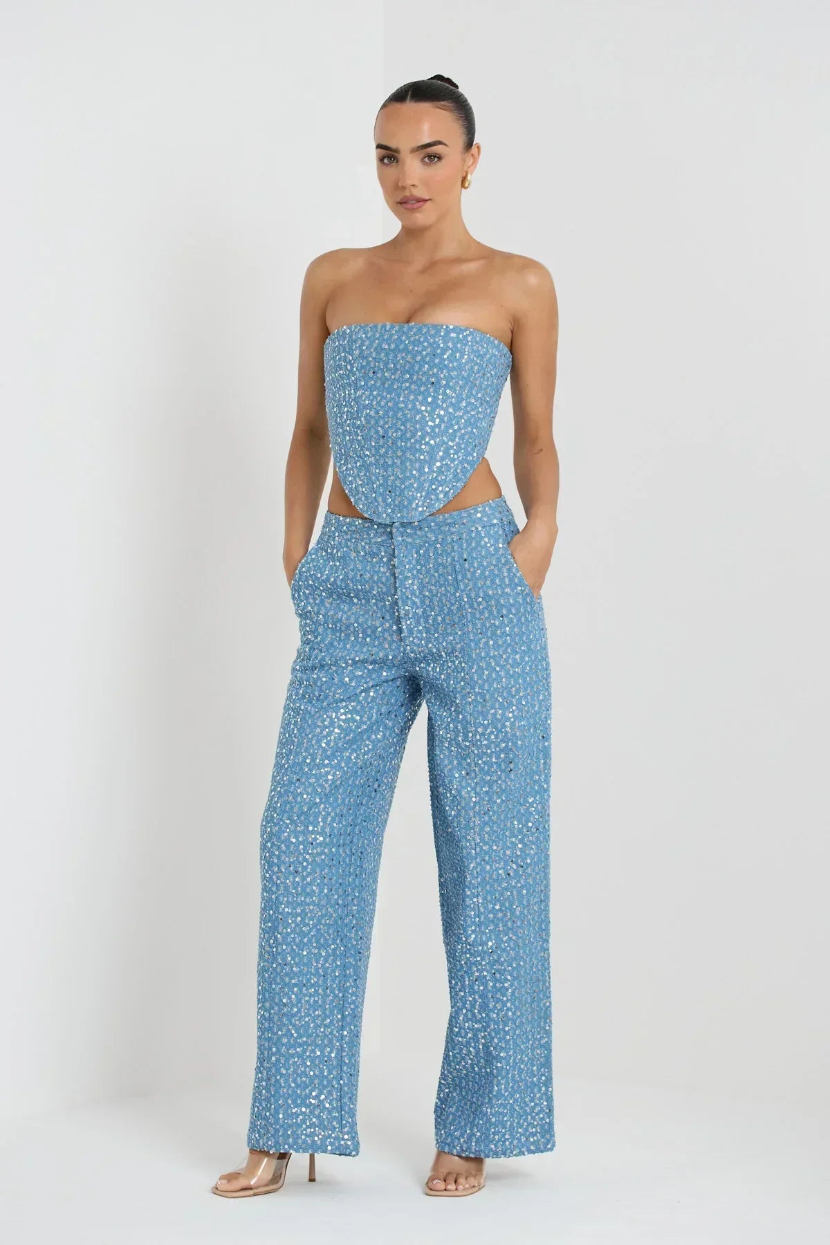Blue tube top with sequins and wide leg pants with glitter