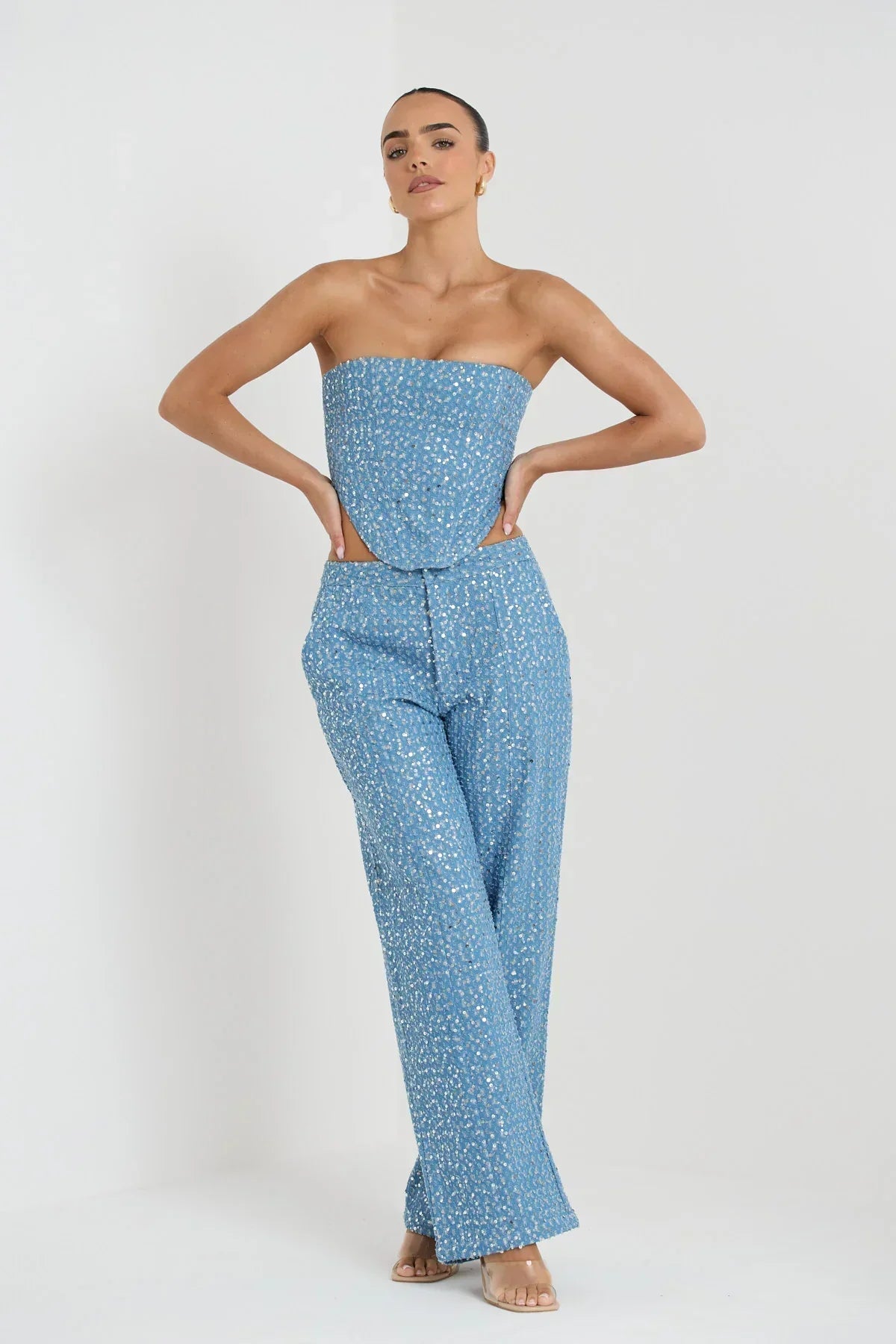 Blue tube top with sequins and wide leg pants with glitter
