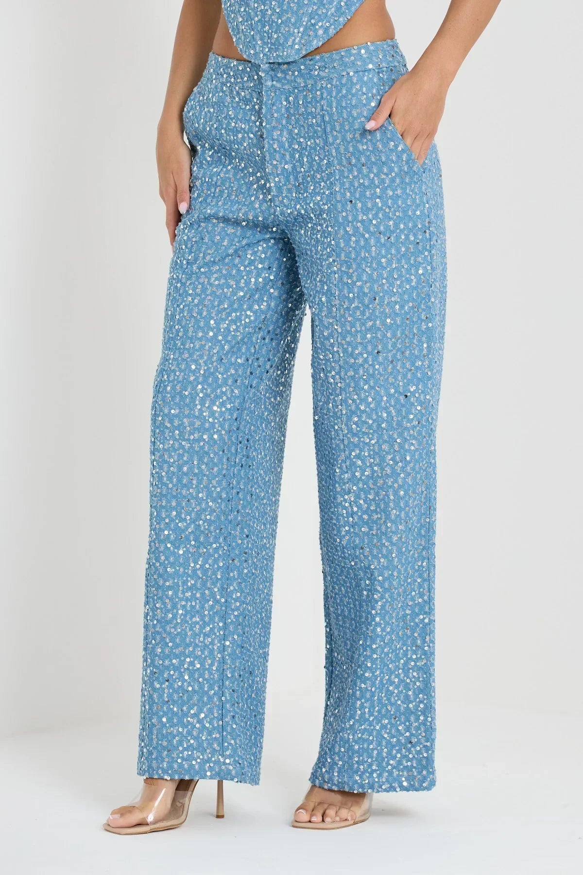 Blue tube top with sequins and wide leg pants with glitter