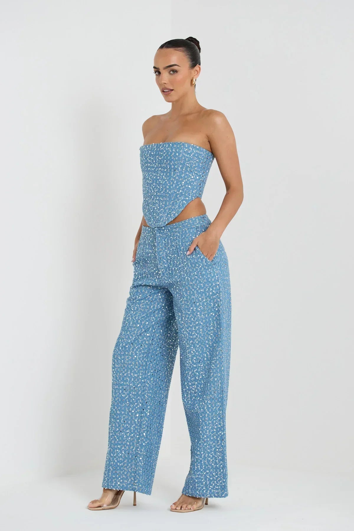 Blue tube top with sequins and wide leg pants with glitter