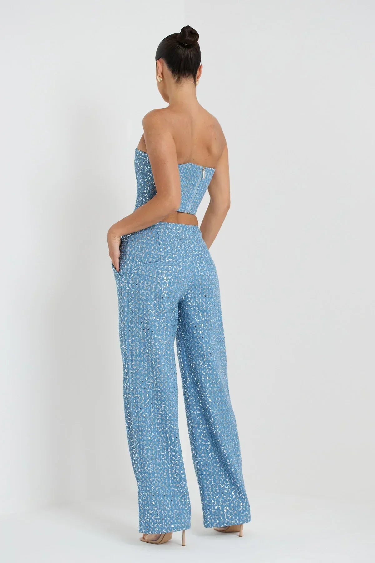 Blue tube top with sequins and wide leg pants with glitter