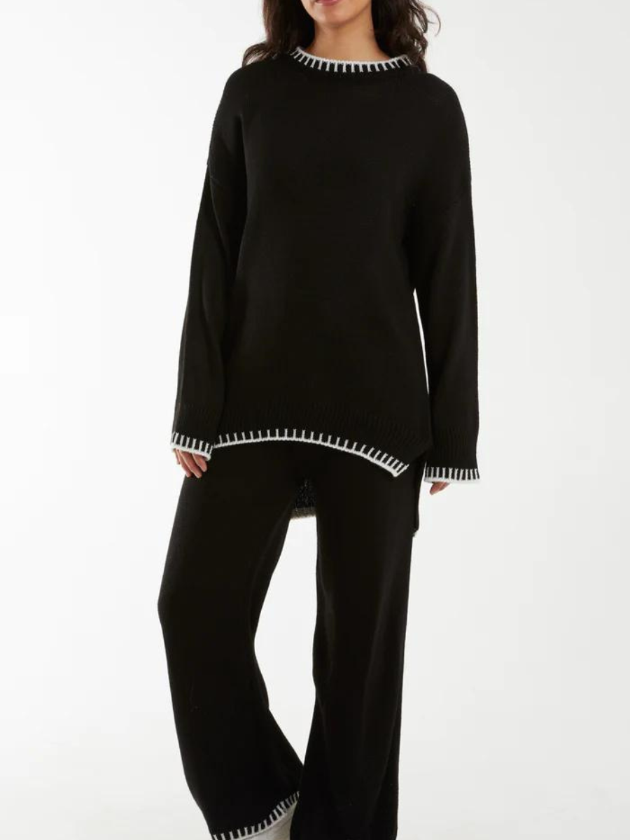 Knitted cable coordination law with sewn hem