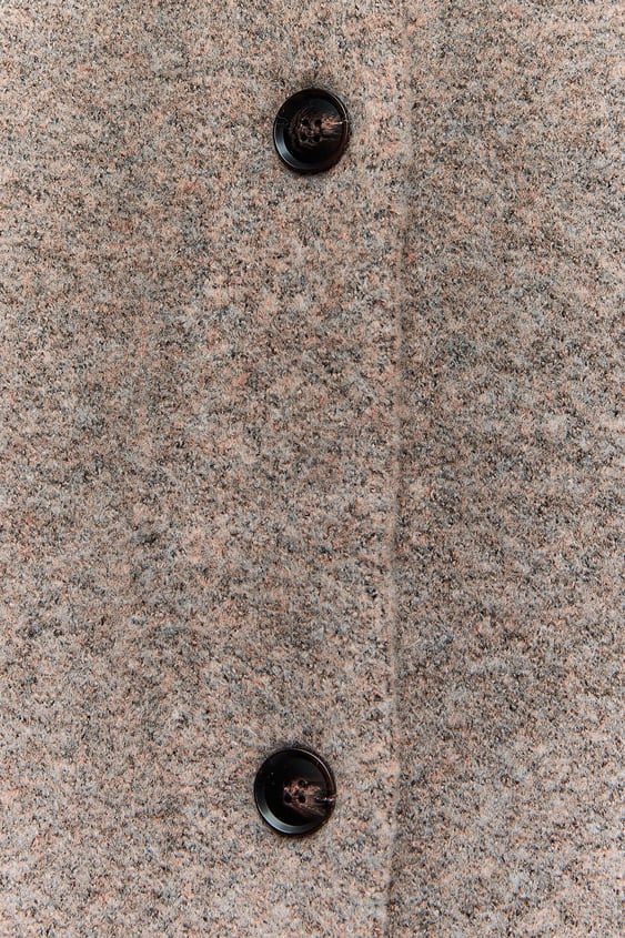 Short knitted coat with scarf