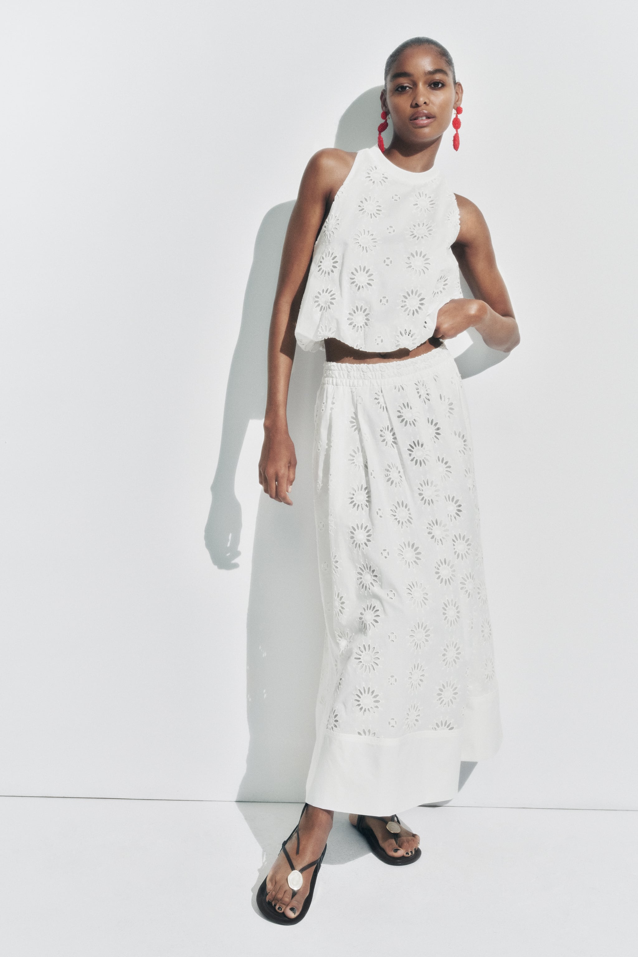 Openwork embroidered white top with skirt
