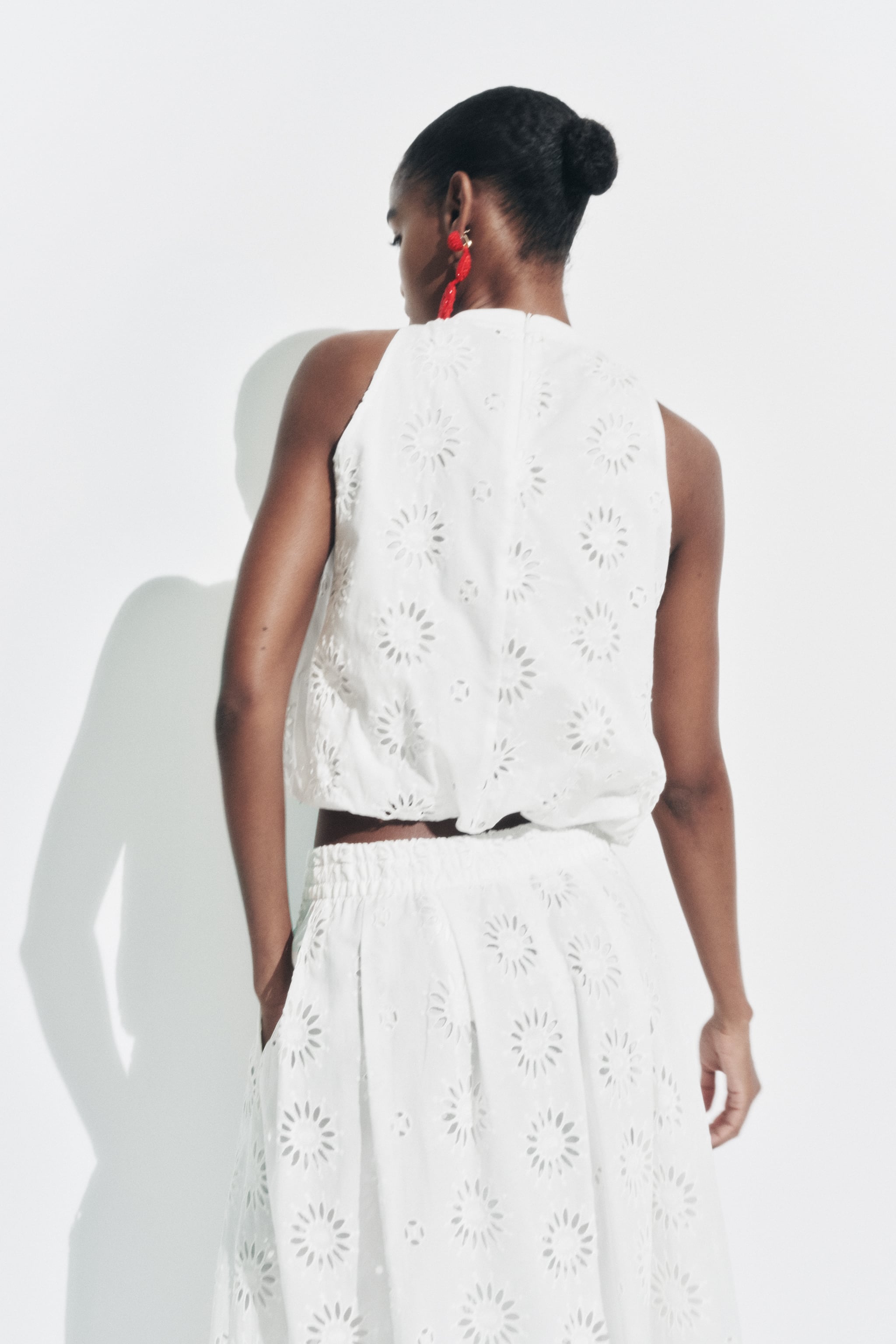 Openwork embroidered white top with skirt