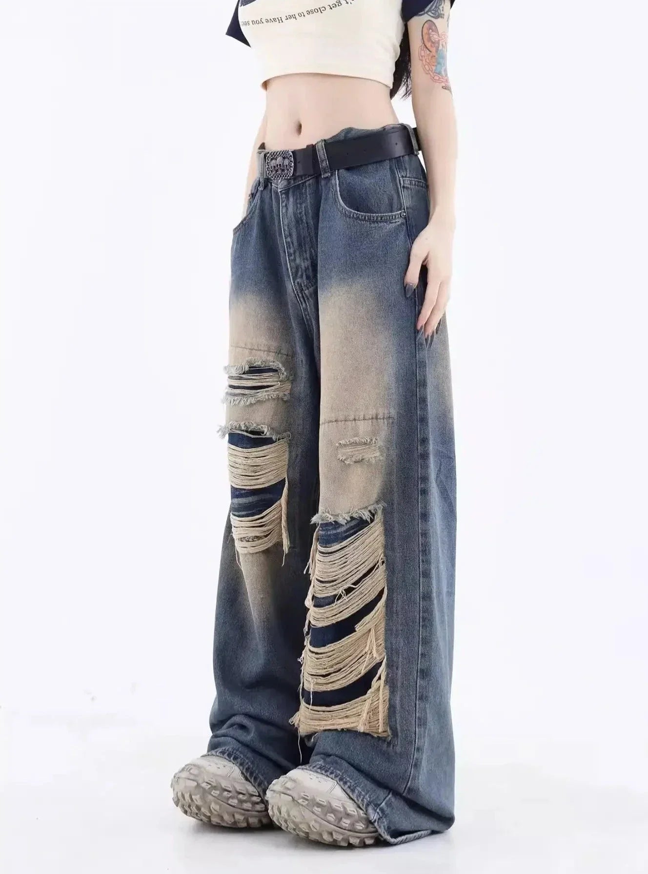Ripped loose jeans