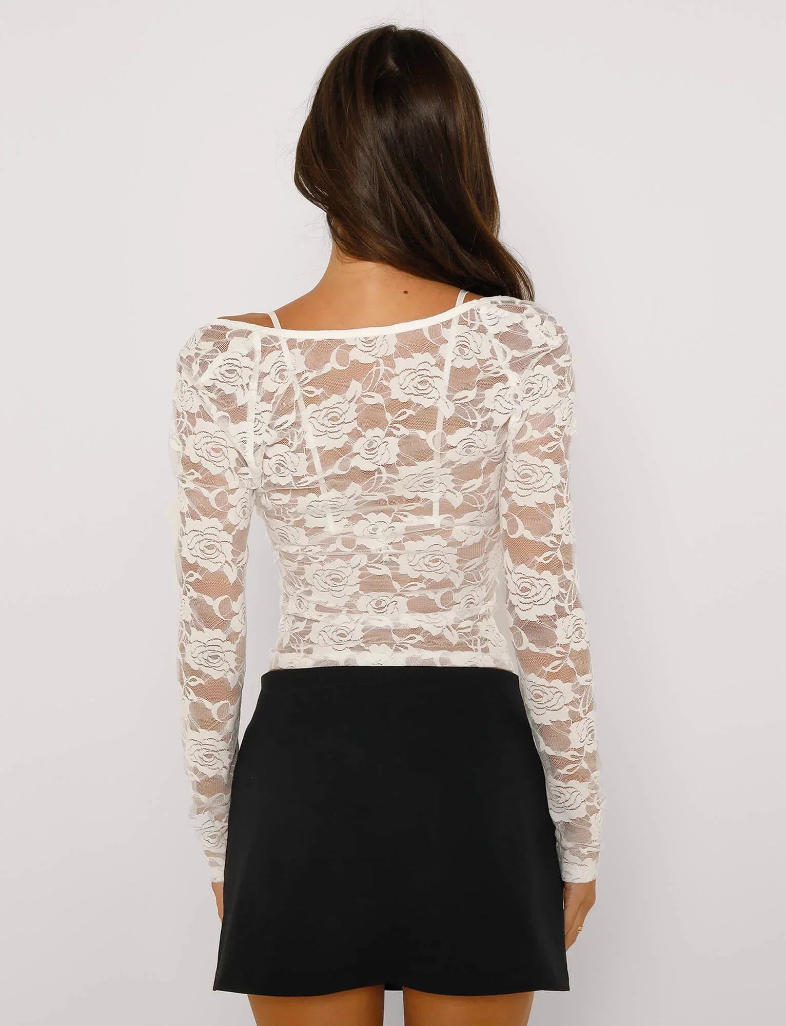 Translucent top with floral pattern
