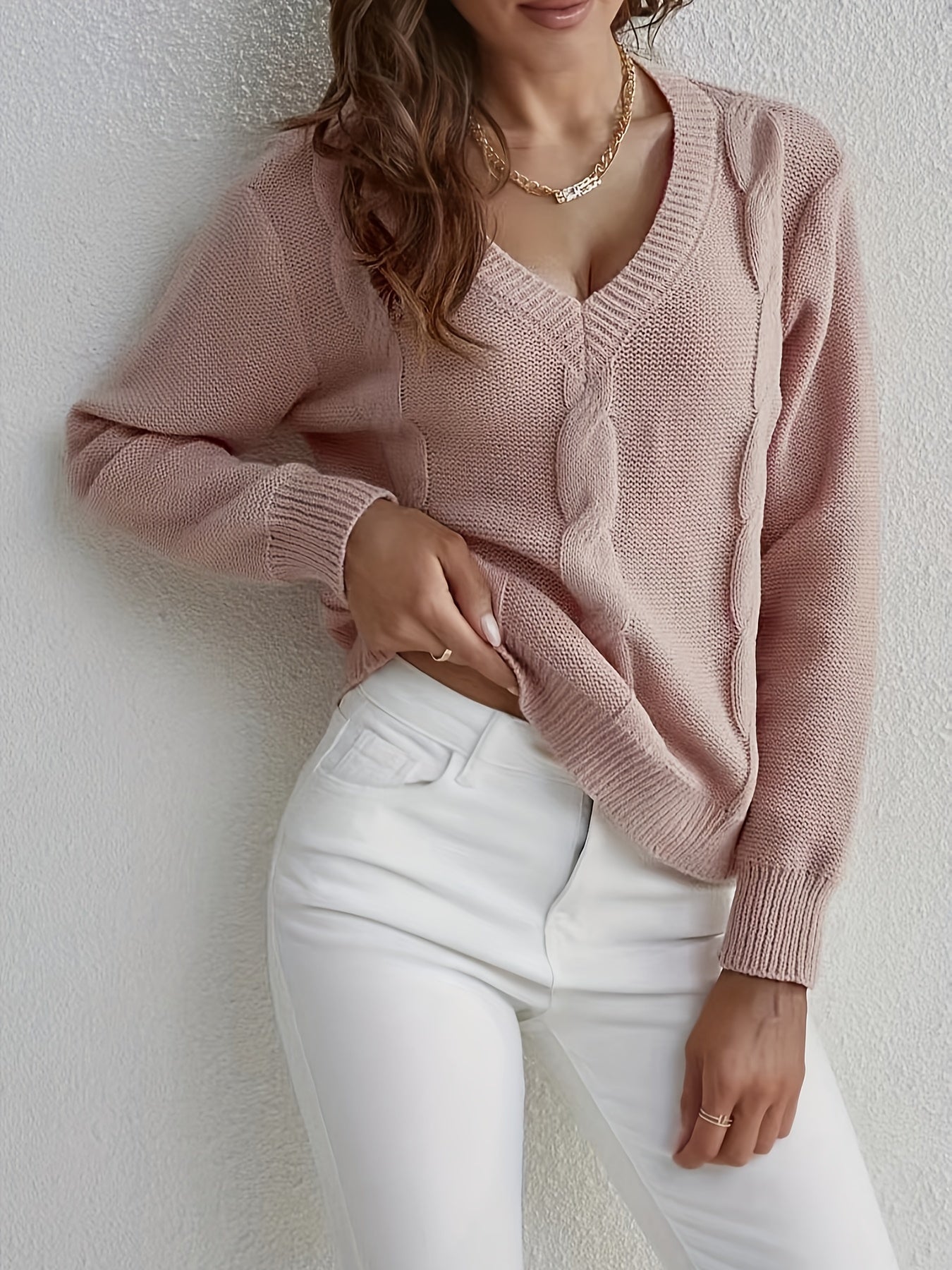 Knitted sweater with V-neck