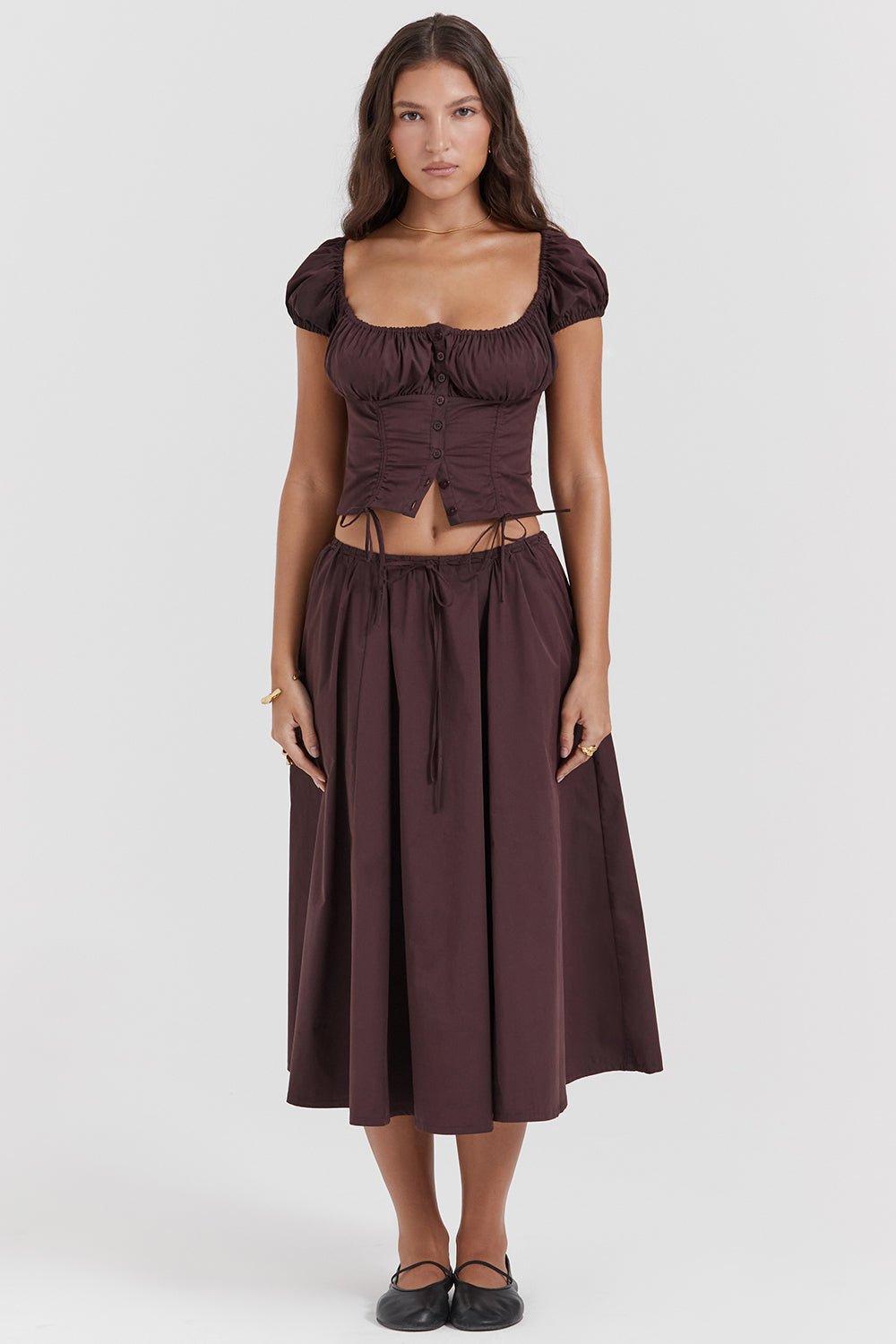 Top with ruffles in deep brown and midi skirt with ruffles