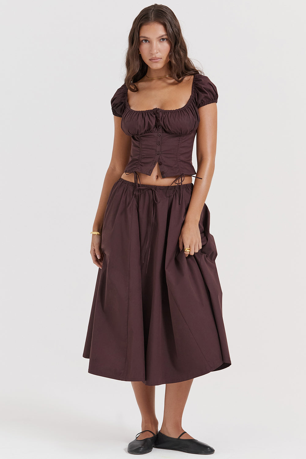 Top with ruffles in deep brown and midi skirt with ruffles