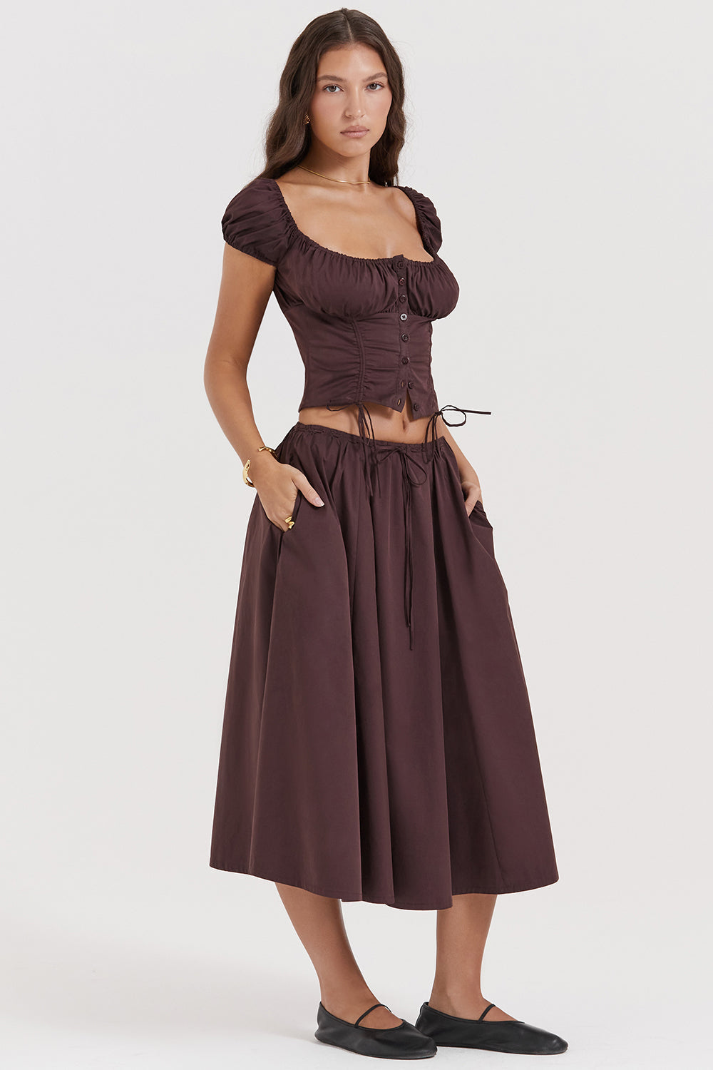 Top with ruffles in deep brown and midi skirt with ruffles