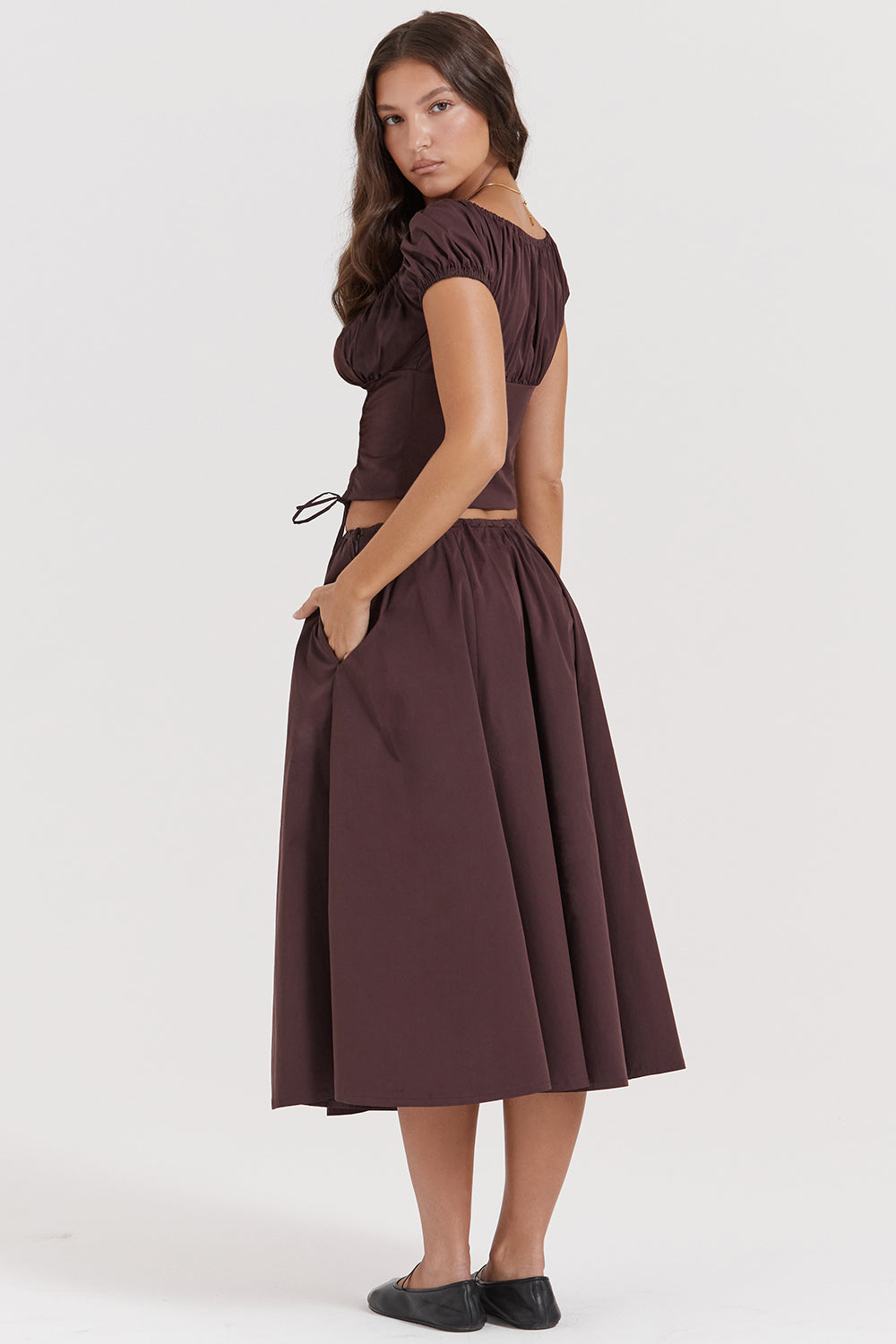 Top with ruffles in deep brown and midi skirt with ruffles