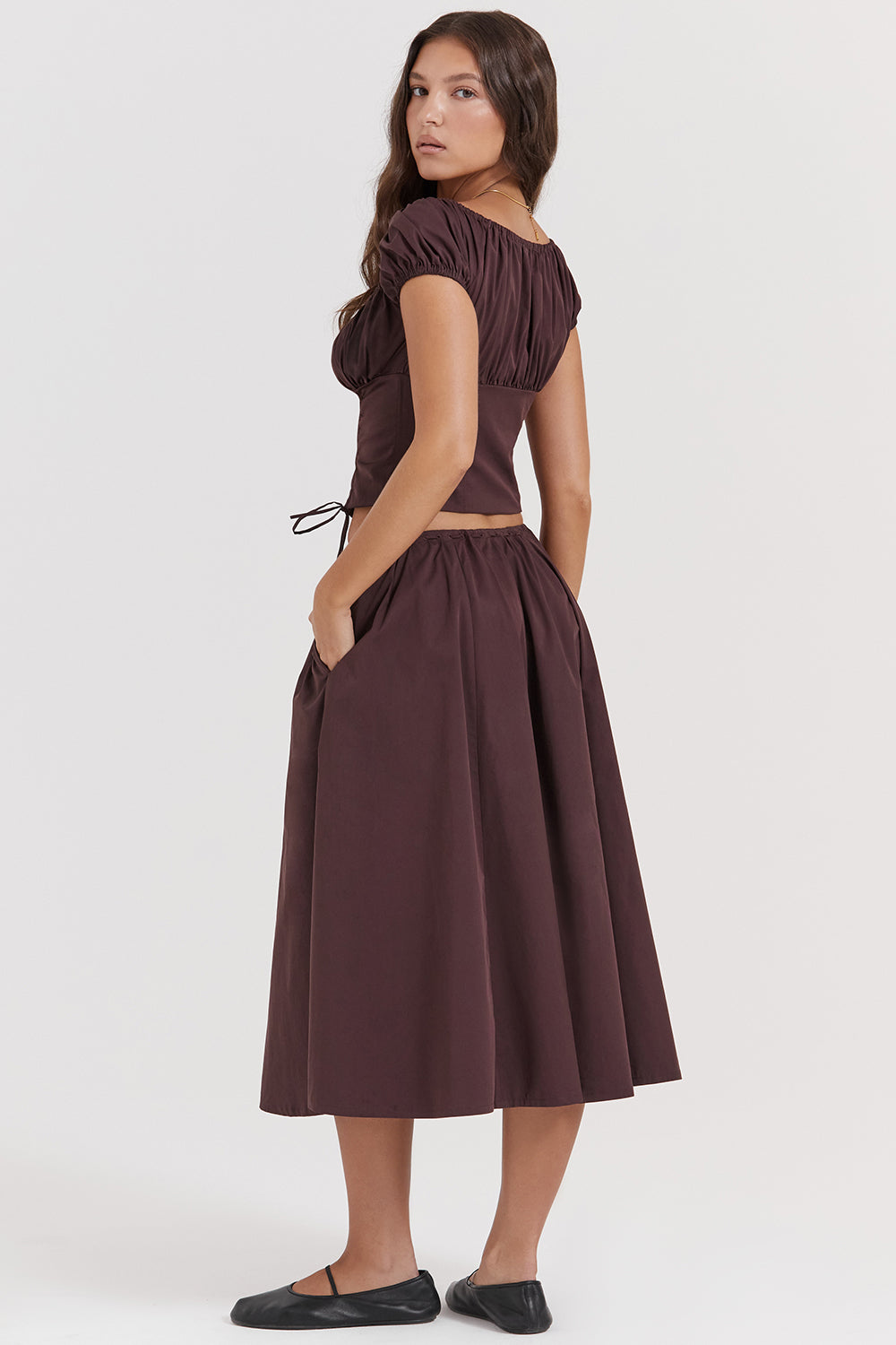 Top with ruffles in deep brown and midi skirt with ruffles