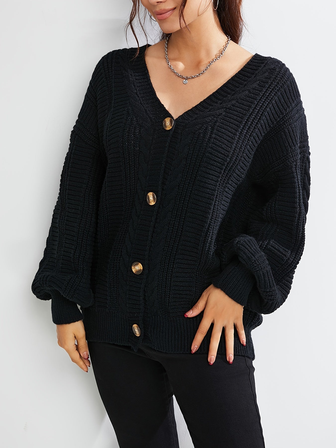 Black cardigan with buttons for women