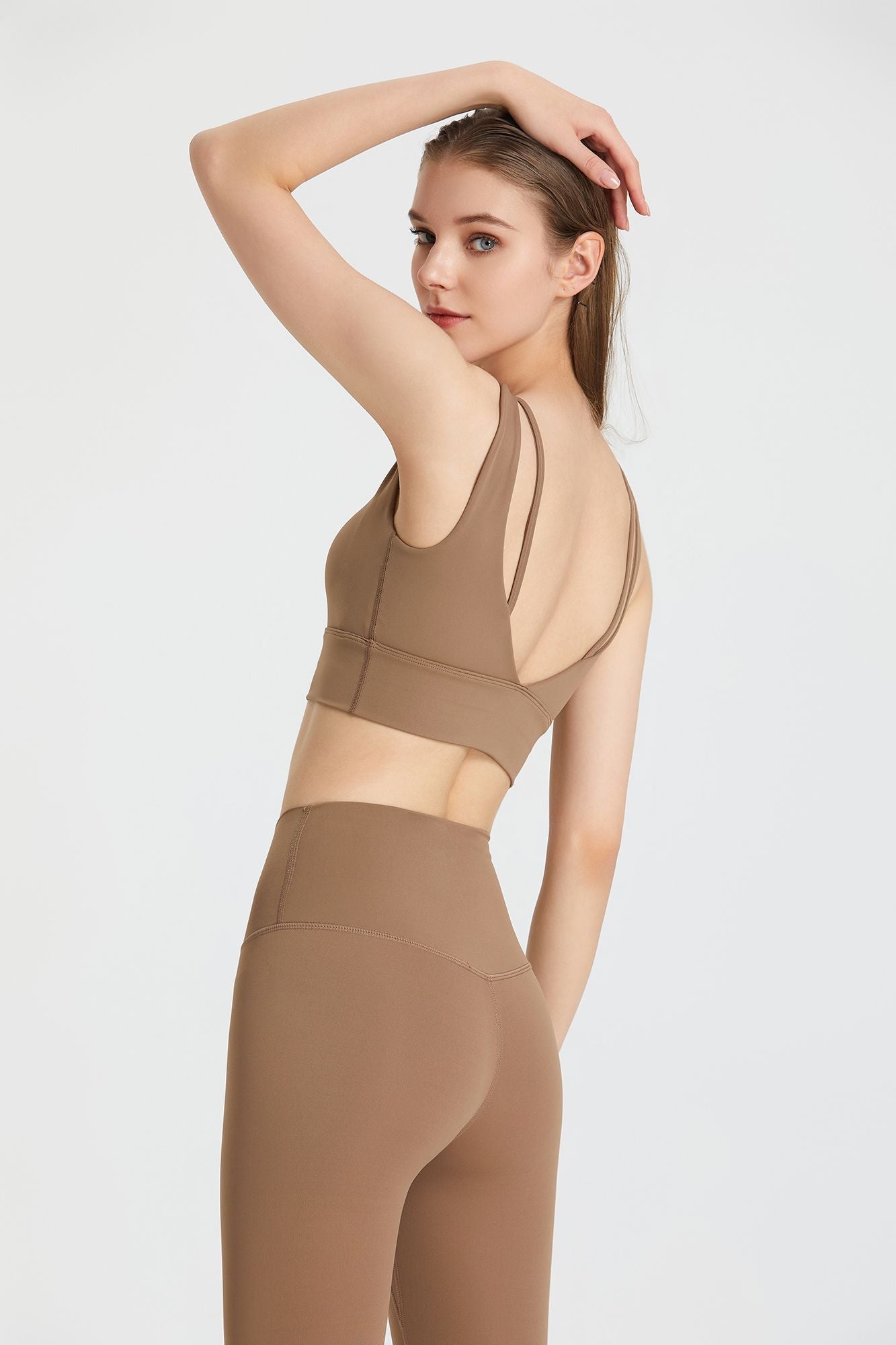 Sports bra with a deep V-neck and open back