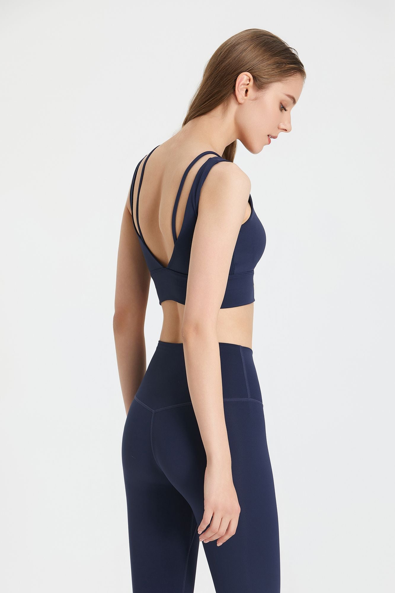 Sports bra with a deep V-neck and open back