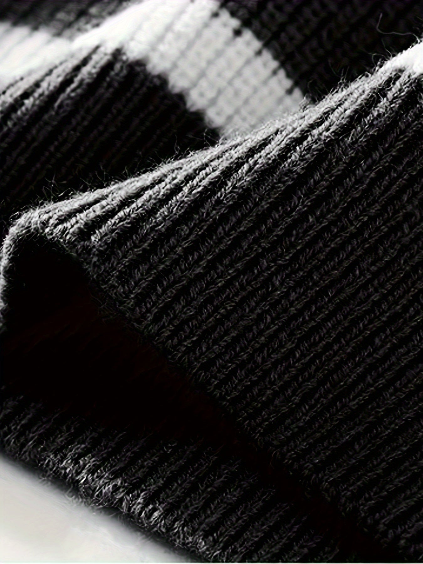 Knitted sweater with striped pattern