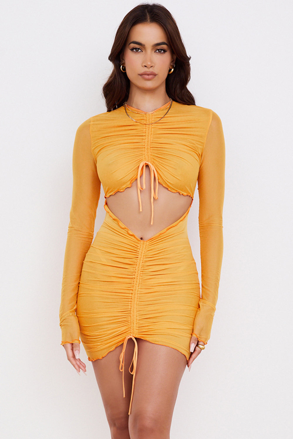 Orange mesh mini dress with long sleeves and cut out with ruffles