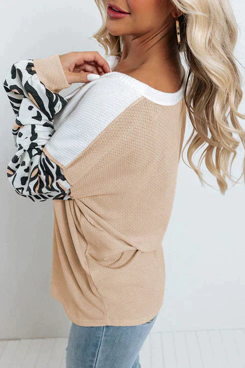 Patchwork waffle knit top with leopard sleeves