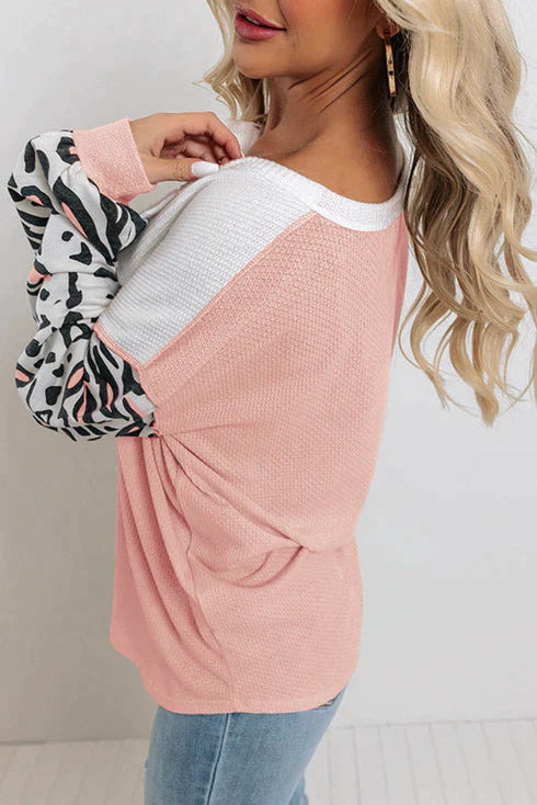 Patchwork waffle knit top with leopard sleeves