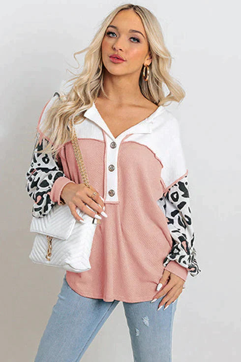 Patchwork waffle knit top with leopard sleeves