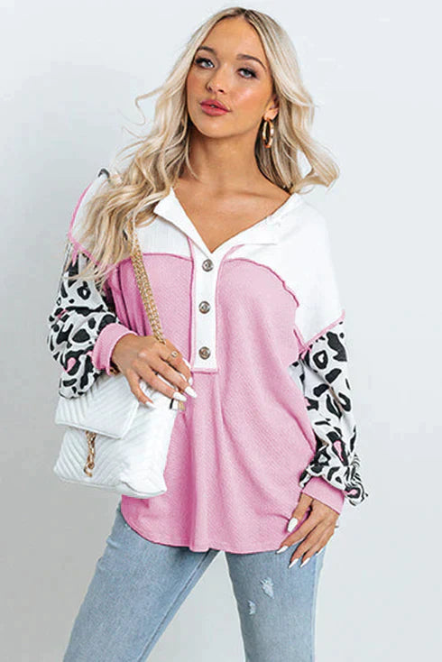 Patchwork waffle knit top with leopard sleeves