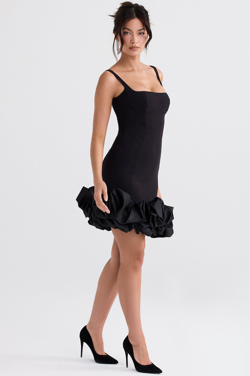 Black dress with ruffles at the hem
