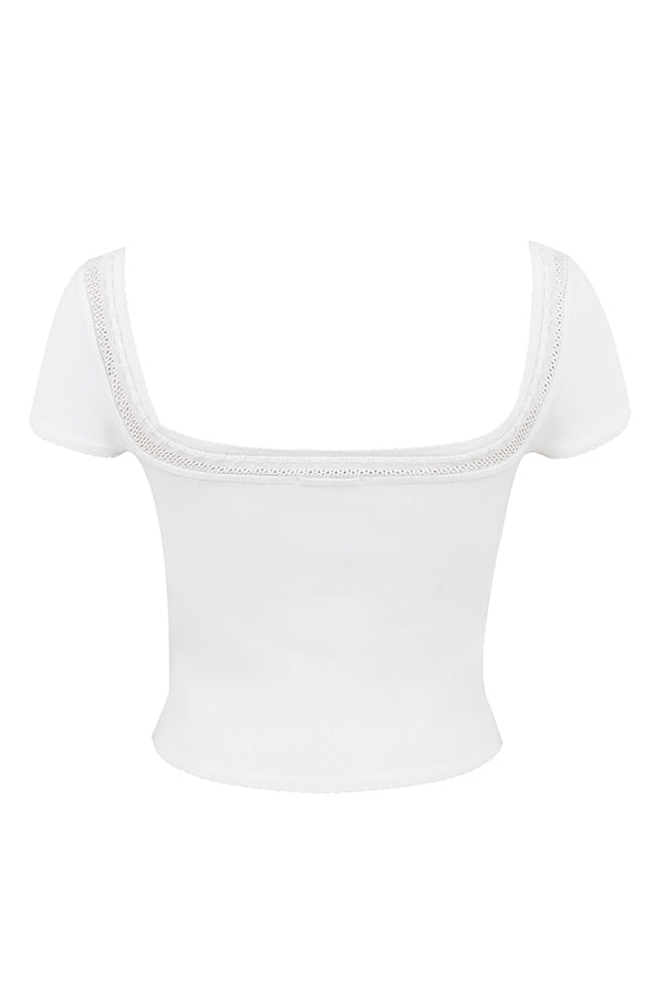 Ivory colored elegant rib knitted top with mini skirt