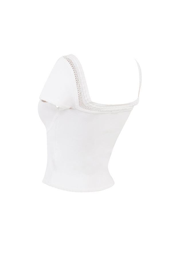 Ivory colored elegant rib knitted top with mini skirt