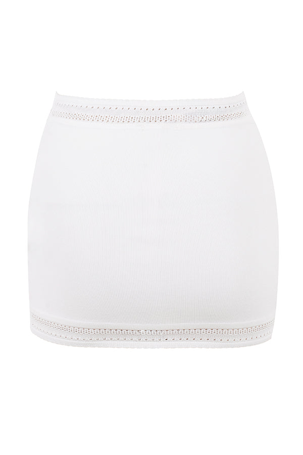 Ivory colored elegant rib knitted top with mini skirt