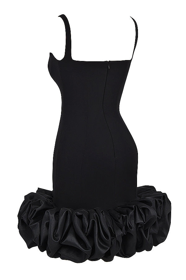 Black dress with ruffles at the hem