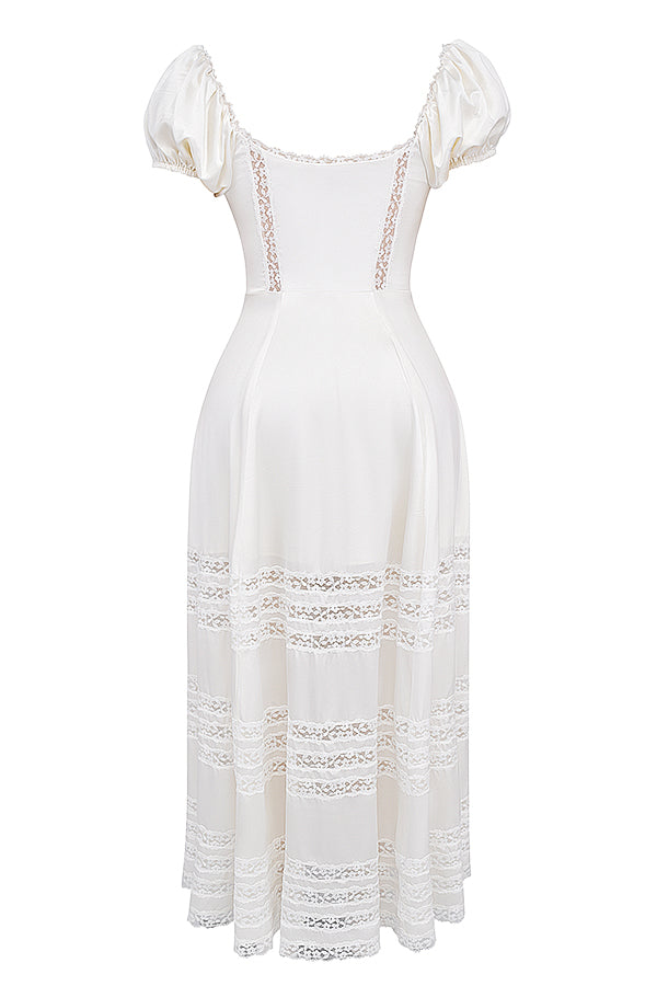 Ivory-colored dress made of real silk with puff sleeves