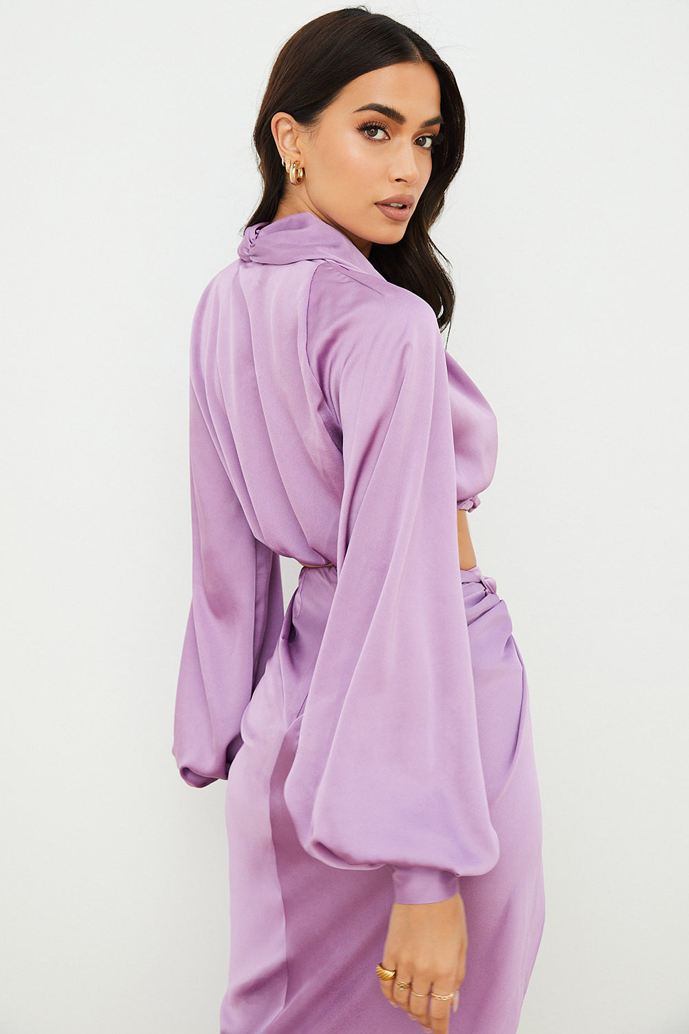 Deep-cut blouson top in silky satin with draped skirt