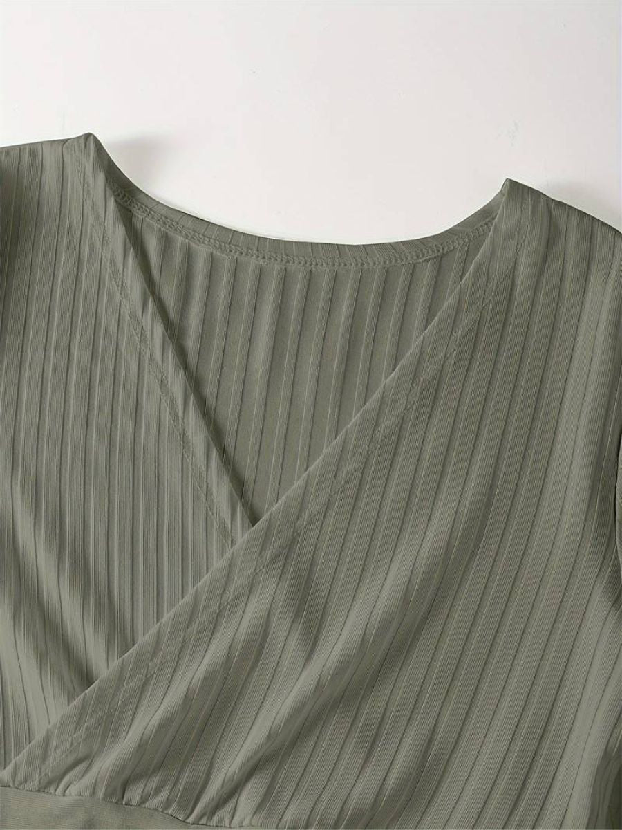 ribbed sleeves with a deep V-neck