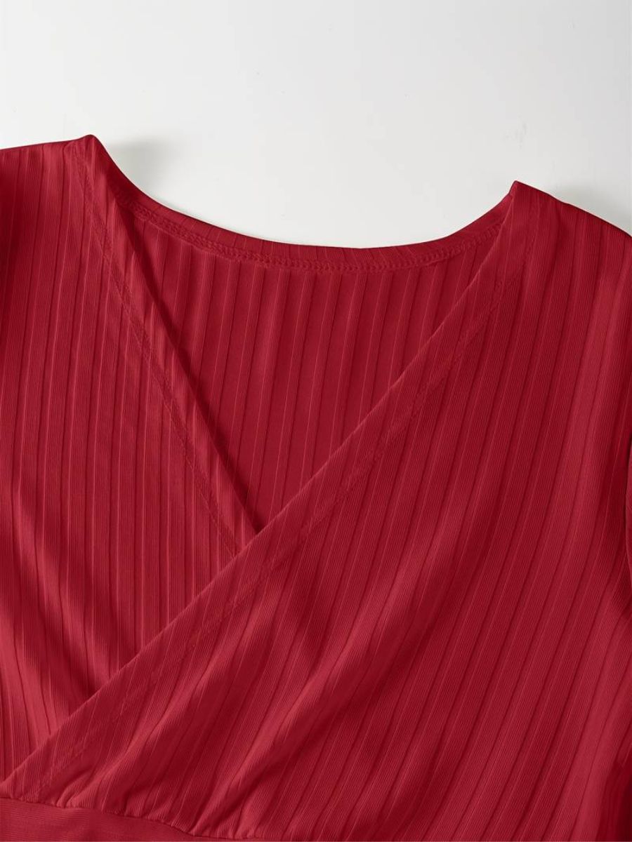 ribbed sleeves with a deep V-neck