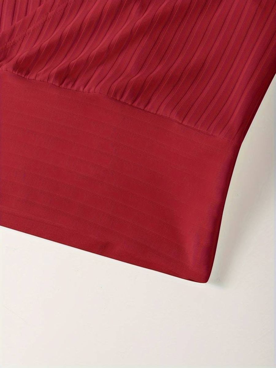 ribbed sleeves with a deep V-neck