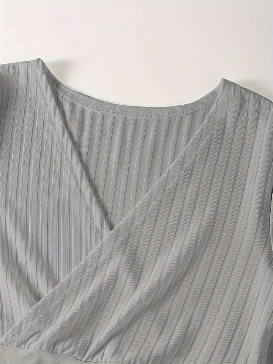 ribbed sleeves with a deep V-neck