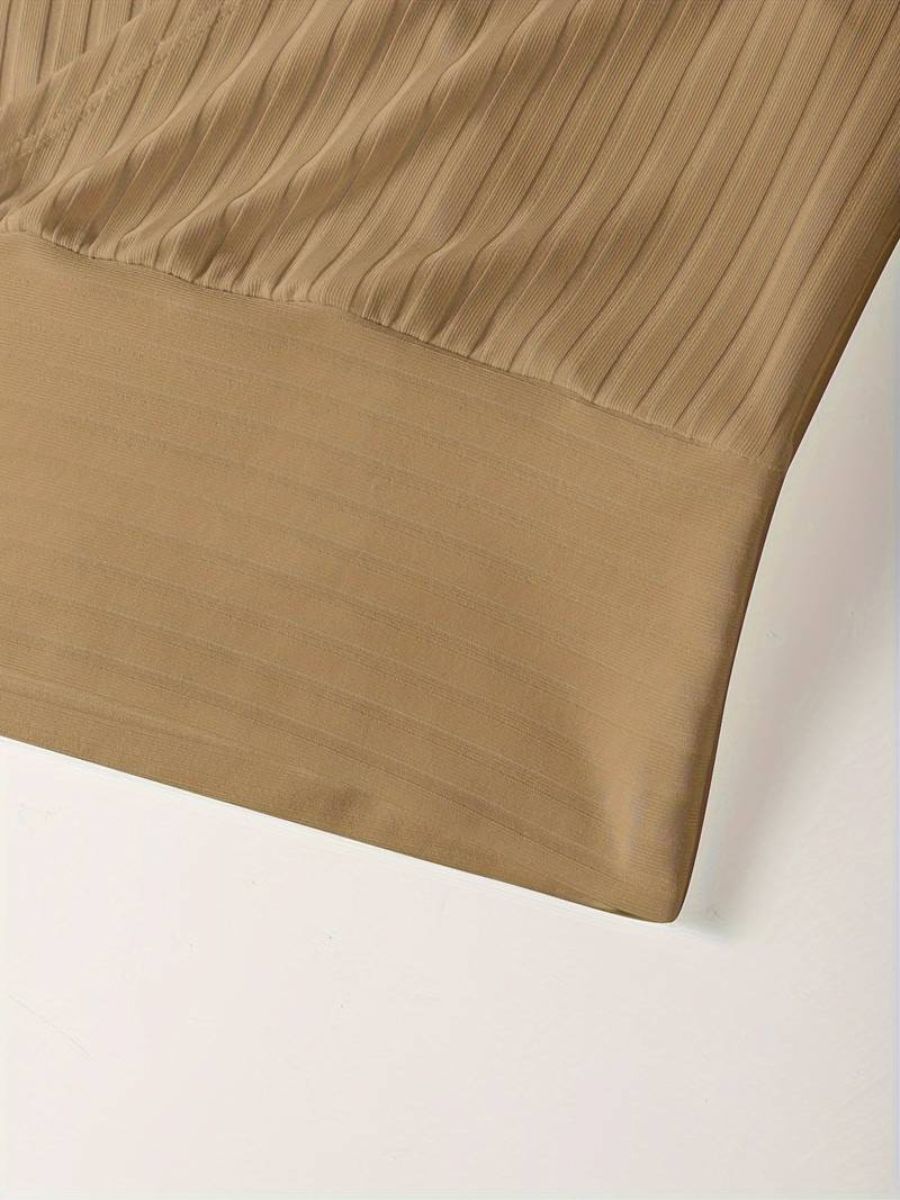 ribbed sleeves with a deep V-neck