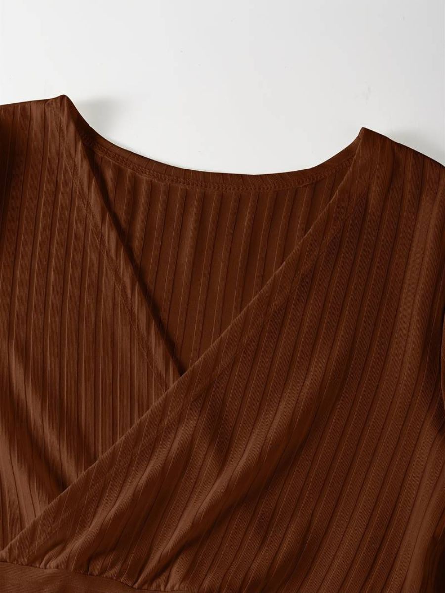 ribbed sleeves with a deep V-neck