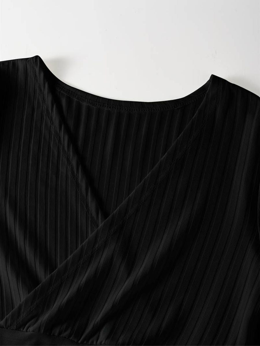 ribbed sleeves with a deep V-neck