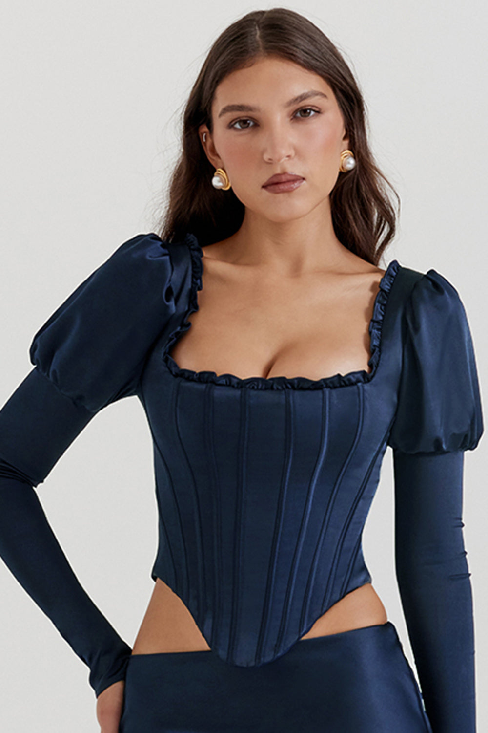 Navy blue corset with puff sleeves and satin maxi skirt with bias cut
