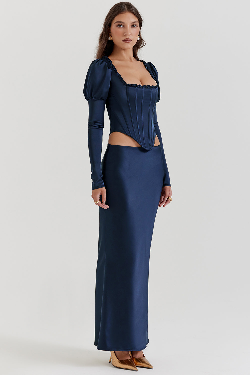 Navy blue corset with puff sleeves and satin maxi skirt with bias cut