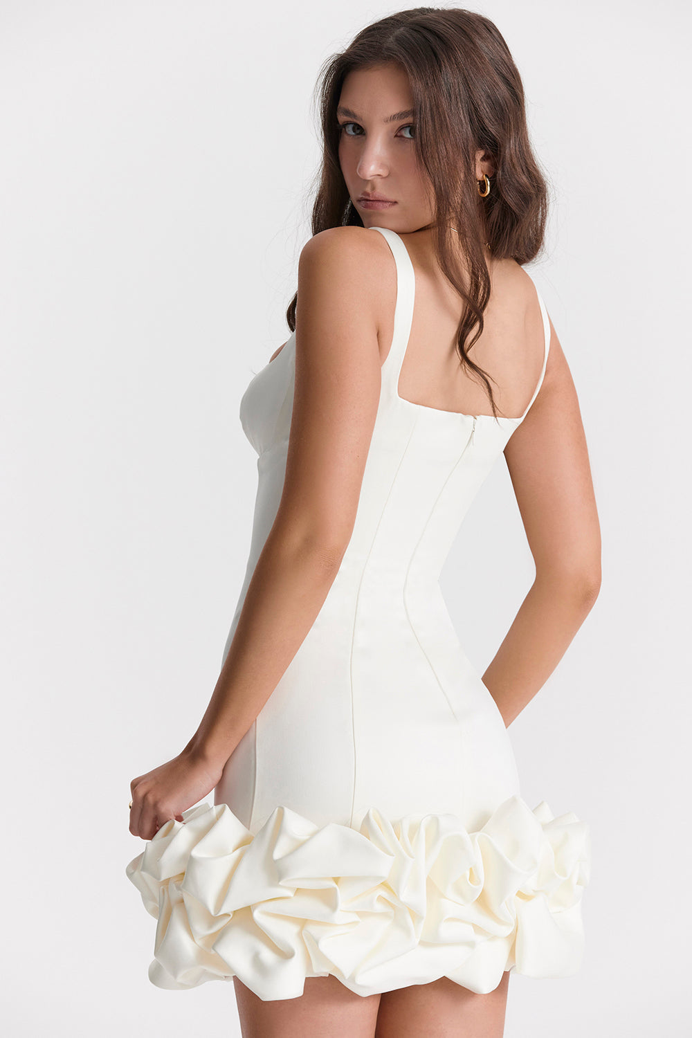 Dress with ruffles at the hem