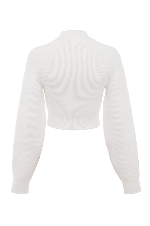 White ribbed sweater with balloon sleeves and cargo skirt