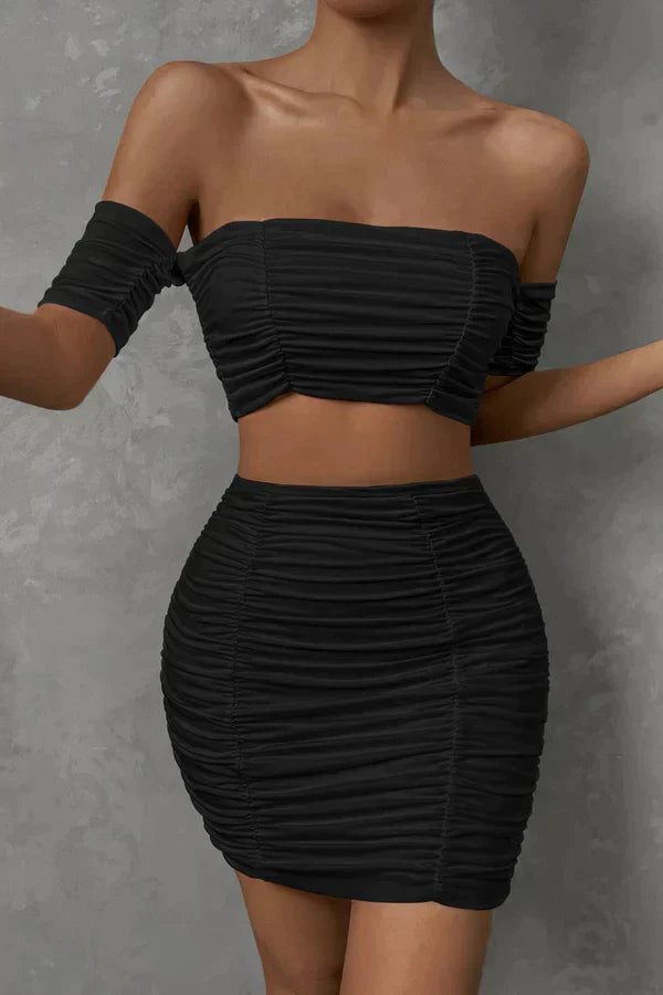 Elegant top and skirt with ruffles on the shoulders