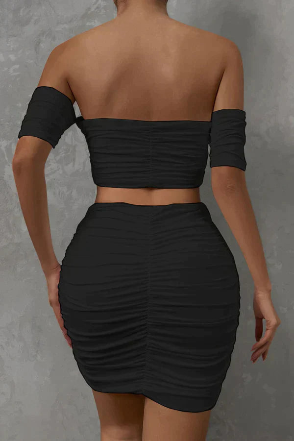 Elegant top and skirt with ruffles on the shoulders